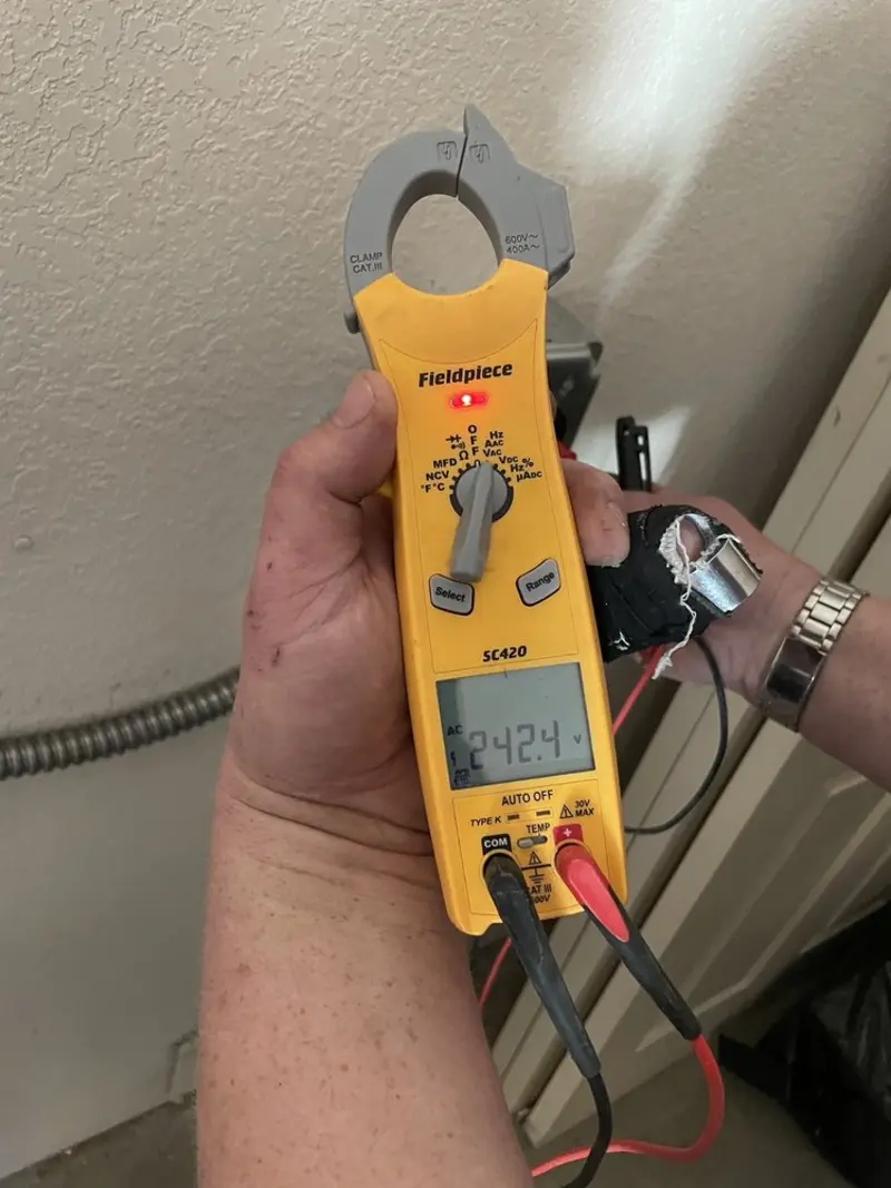 Voltage testing with clamp meter during Hot Tub / Pool Electrical Wiring in New Palestine